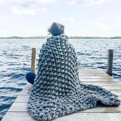 Arm knit seed stitch blanket