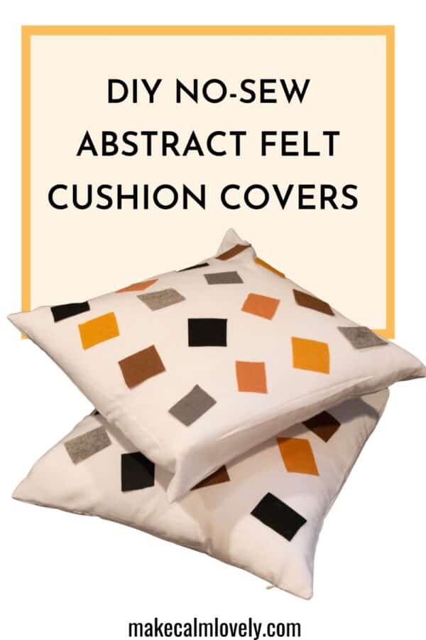 white pillow with colored felt squares 