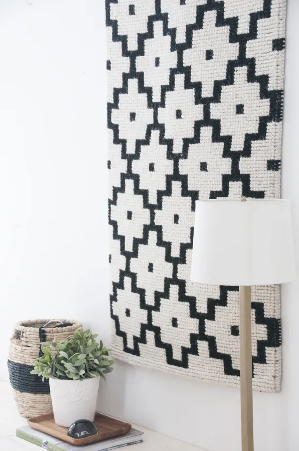 DIY black and white woven wall hanging.