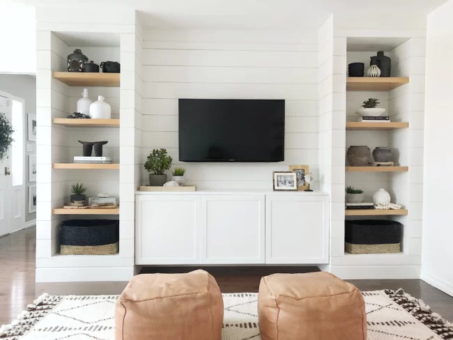 White built in IKEA Besta cabinets.