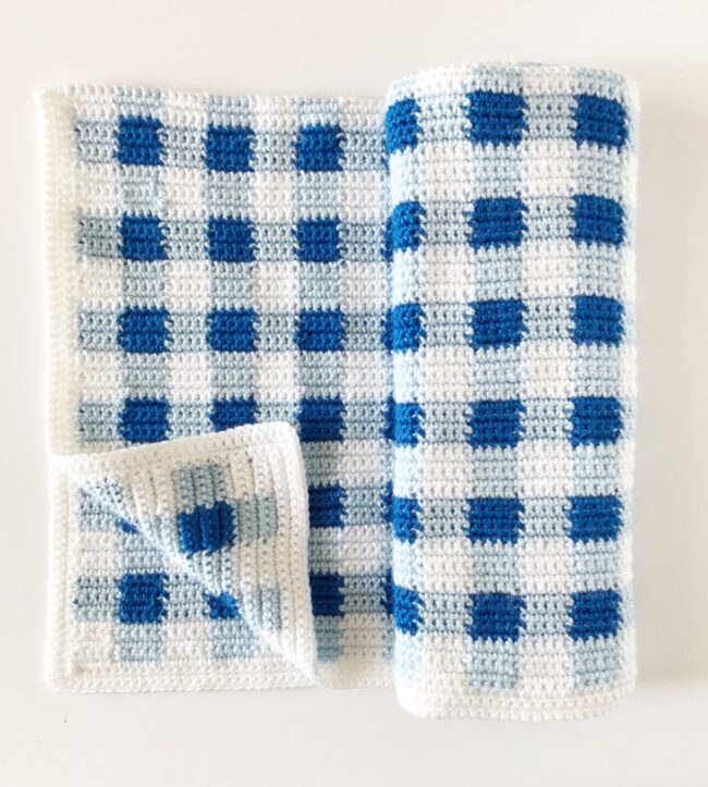 Blue and white checked gingham crochet blanket.