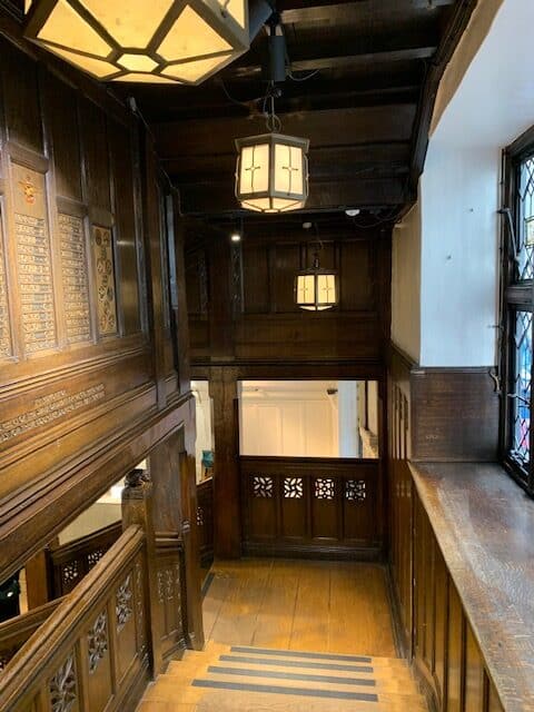 Carved wooden staircase inside Liberty's of London.