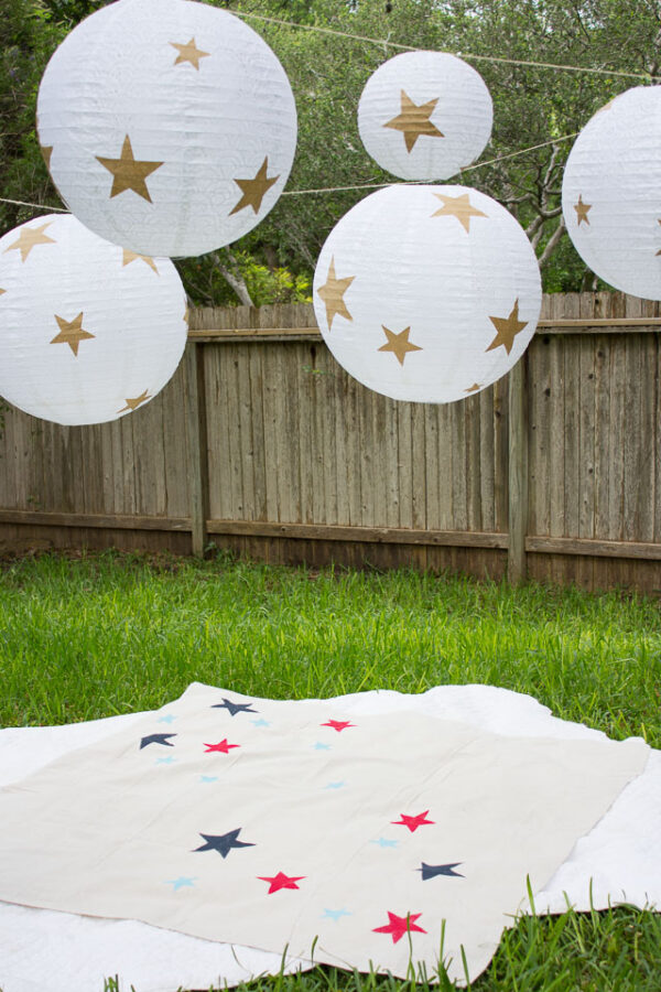 Picnic blanket for 4th of July with red and blue stars.