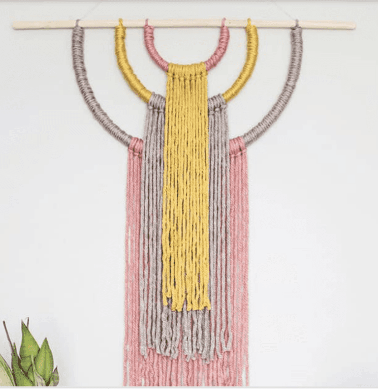 Statement wall hanging in multi colors.