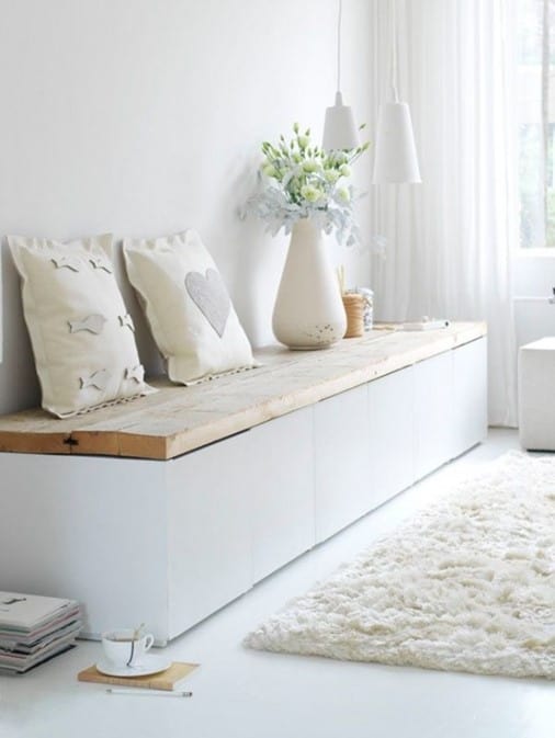 Simple stylish white and repurposed wood IKEA Besta bench DIY hack.