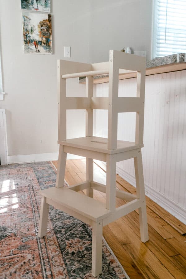 wooden step stool turned into learning tower.