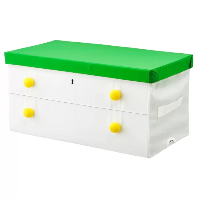 White storage box with green lid.