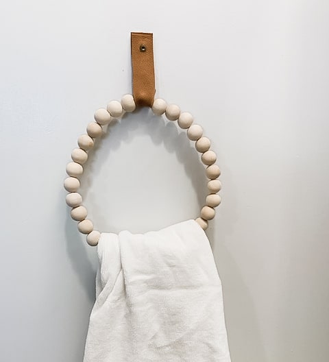 Wooden bead towel holder