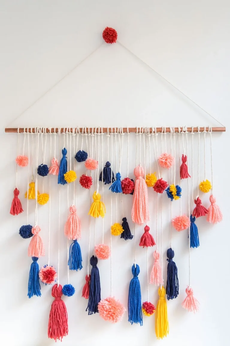 Colorful tassels and pom poms wall hanging.